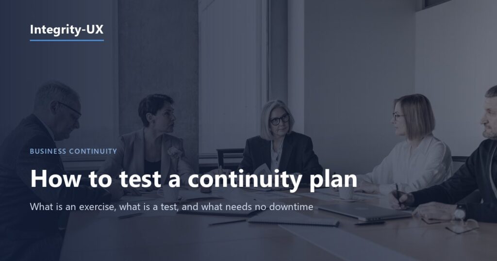 Team around a table reviewing documents during a business continuity plan exercise